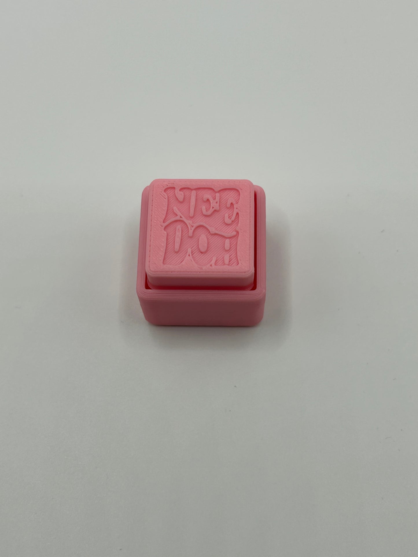 Colorful NiccieNacks NeeDoh Style Fidget Clickers with soft, clickable silicone surfaces in various vibrant colors.
