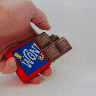 NiccieNacks Wonka Chocolate Candy Bar Fidget Clicker, a fun handheld sensory toy with a chocolate candy bar design.