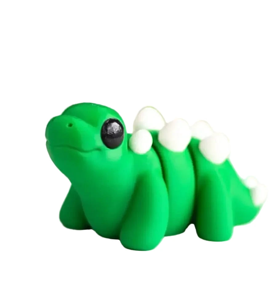Small Stegosaurus Wiggies articulated toy by NiccieNacks, featuring colorful design and movable limbs.