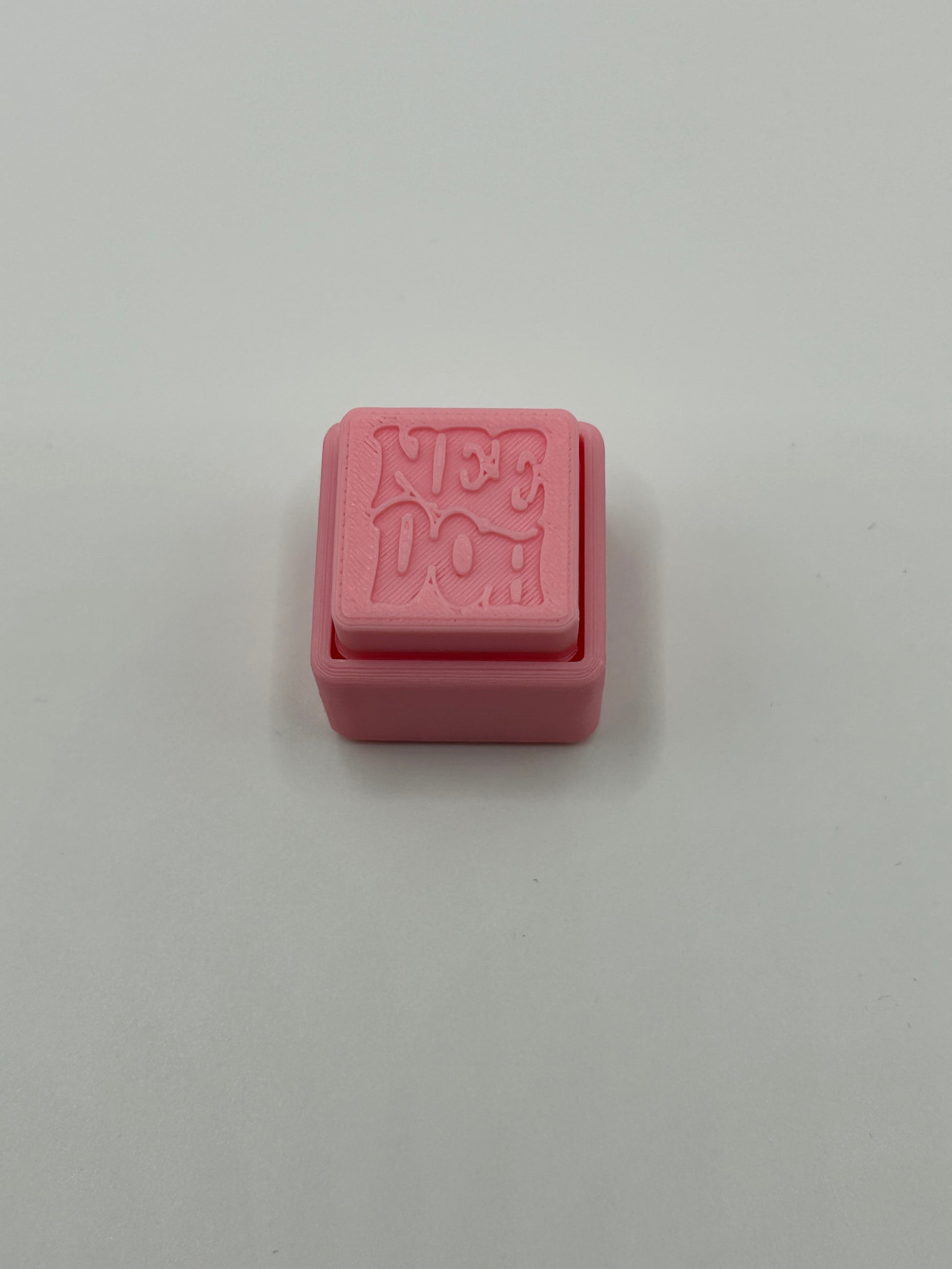Colorful NiccieNacks NeeDoh Style Fidget Clickers with soft, clickable silicone surfaces in various vibrant colors.
