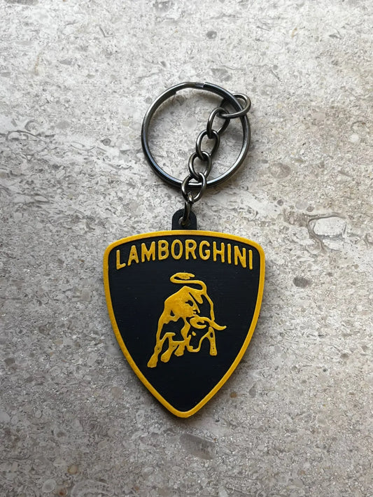 NiccieNacks Lamborghini keyring featuring a detailed miniature car design on a sleek keychain.