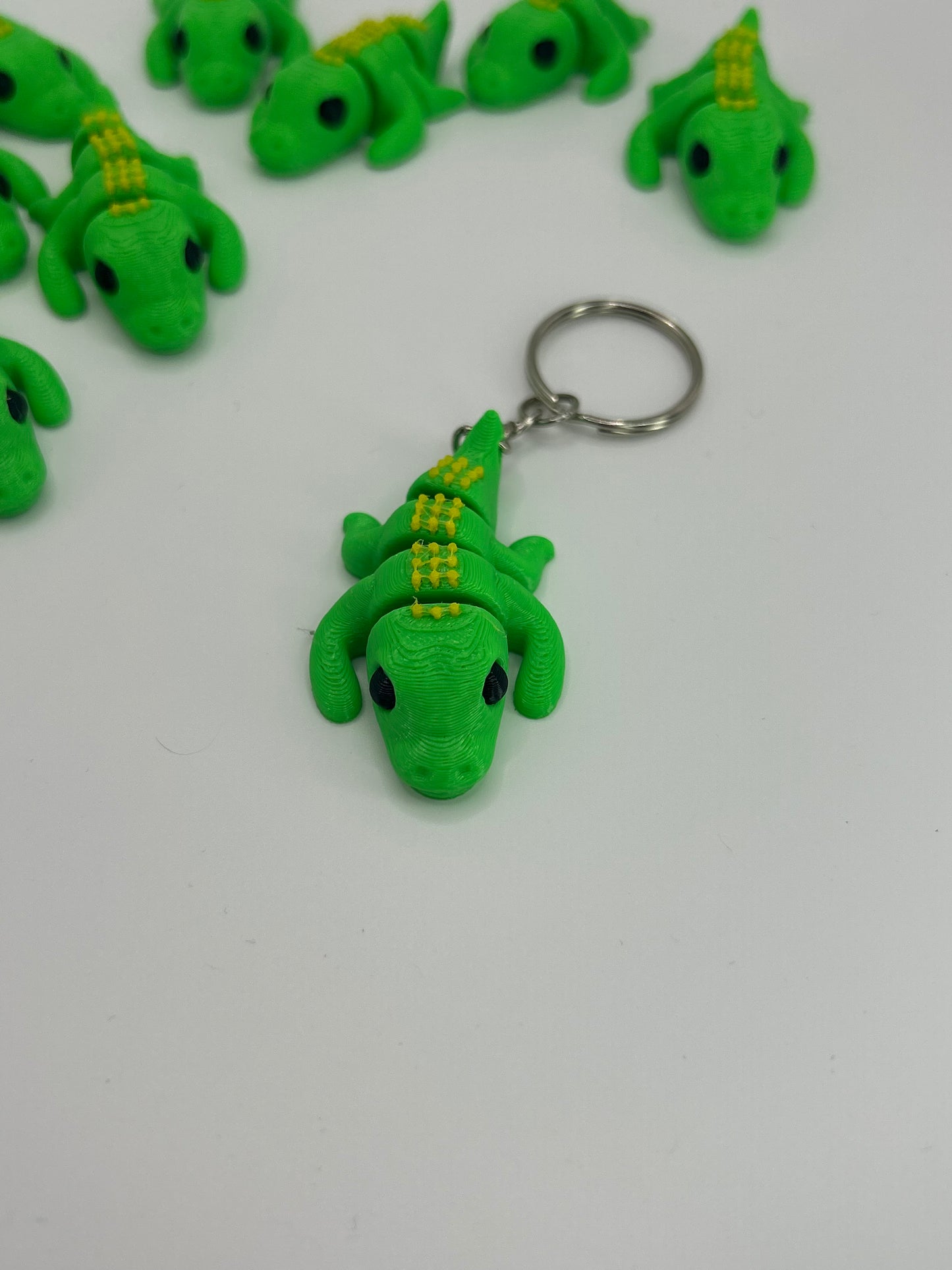 Crocodile Articulated Flexi Wiggies keychain by NiccieNacks, featuring a detailed, flexible crocodile figure with movable joints.