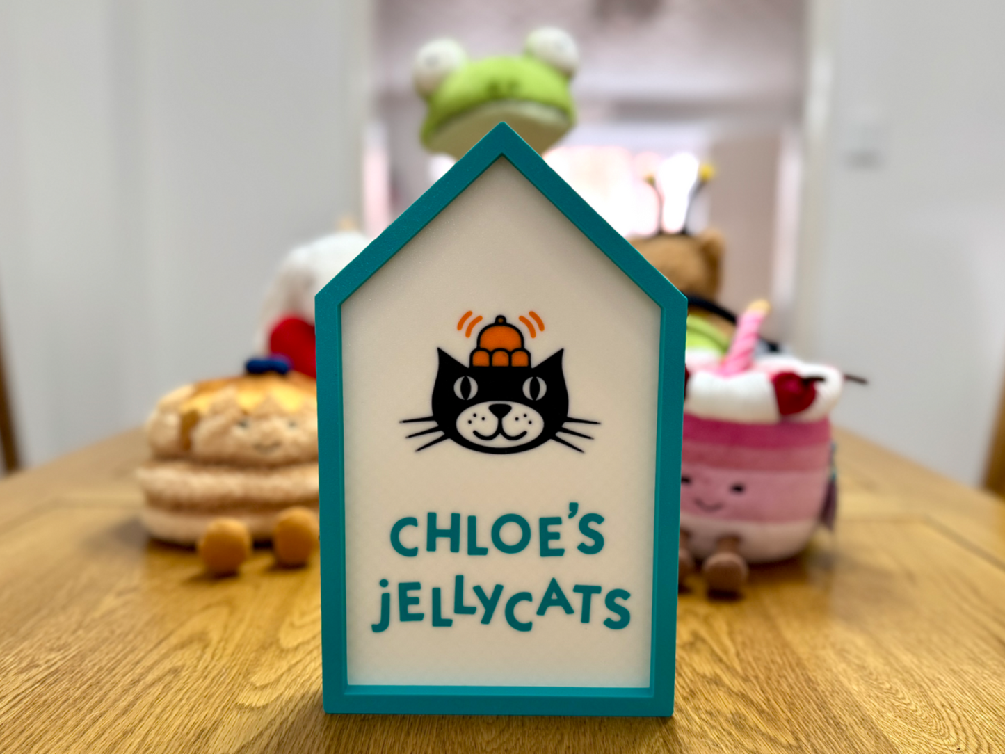 3D printed customizable sign for home display by NiccieNacks, featuring vibrant colors and modern design elements.