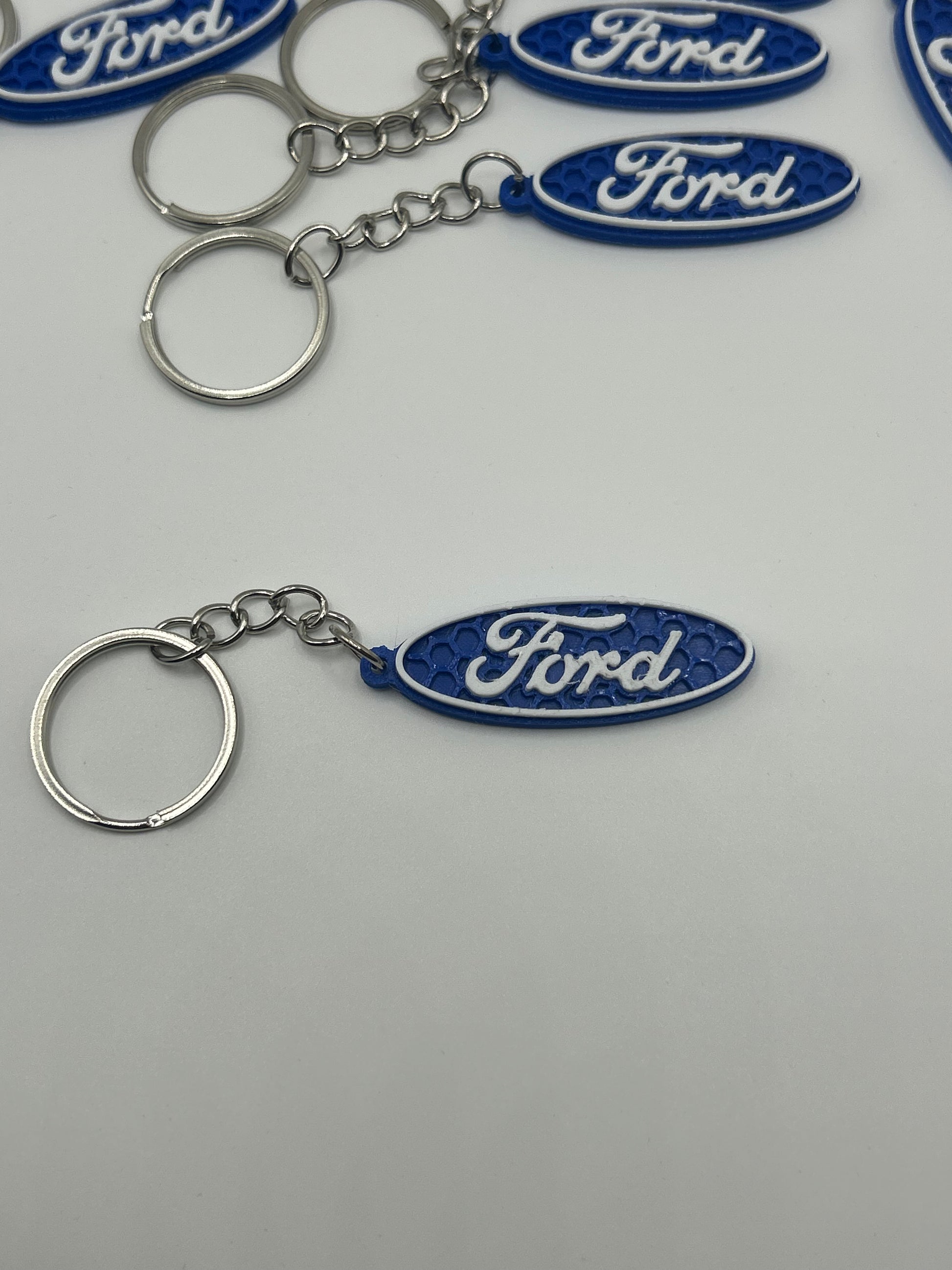 NiccieNacks Ford logo car keyring with metal keychain and embossed Ford emblem, designed for car keys and accessories.