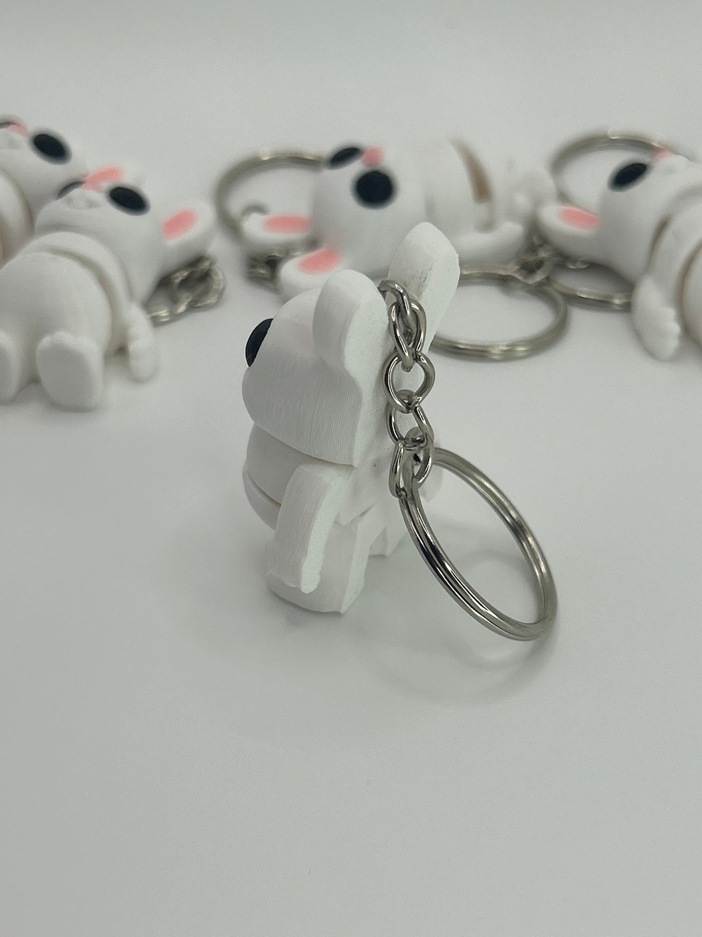 NiccieNacks Bunny Rabbit Articulated Flexi Wiggies toy and keychain showing a cute, flexible bunny figure with vibrant colors.