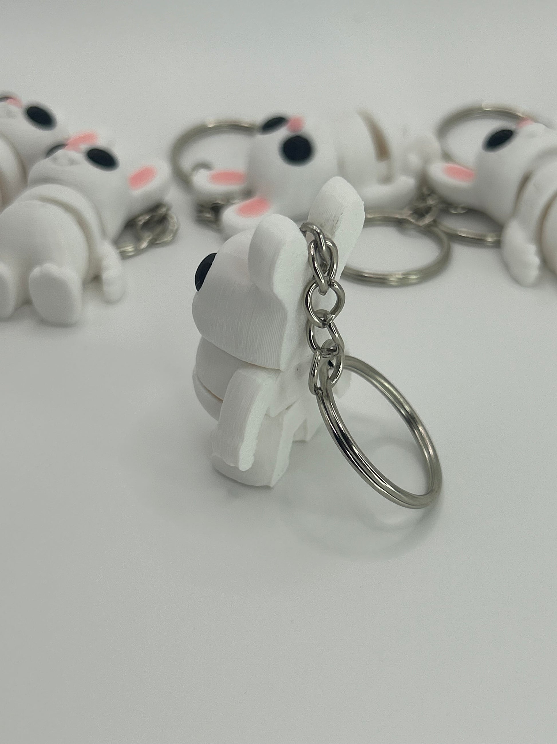 NiccieNacks Bunny Rabbit Articulated Flexi Wiggies toy and keychain showing a cute, flexible bunny figure with vibrant colors.