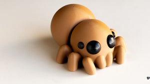 Toy spider on a white background with 'Baby Spider' text