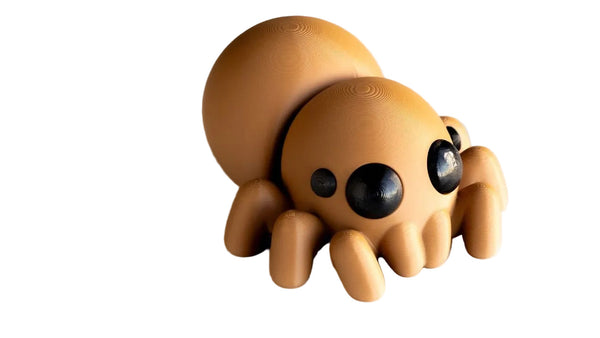 Toy spider on a white background with 'Baby Spider' text