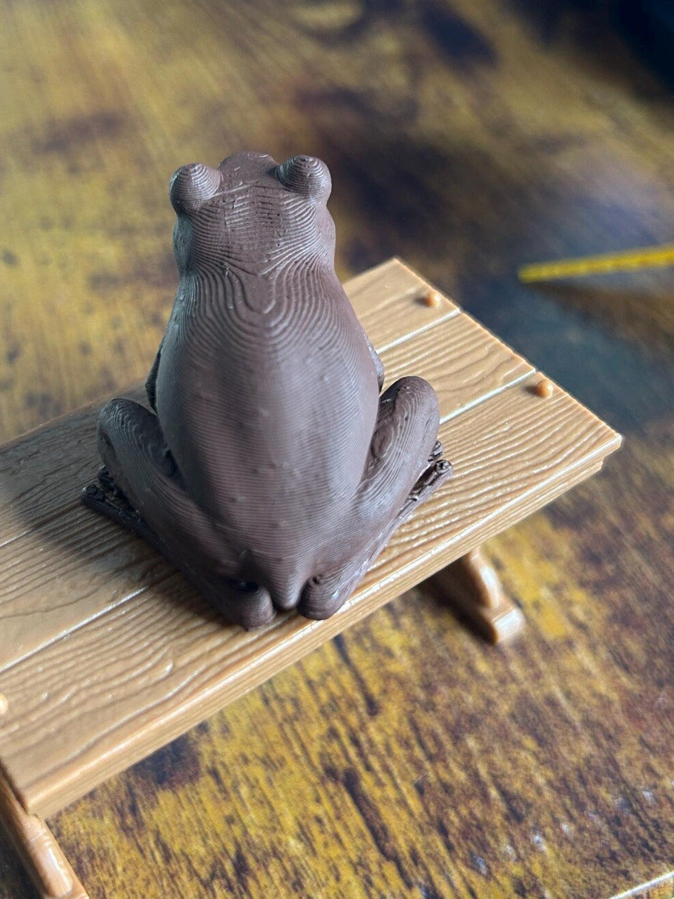 Children's Harry Potter Chocolate Frog 3D printed model by NiccieNacks, detailed and colorful collectible figure.