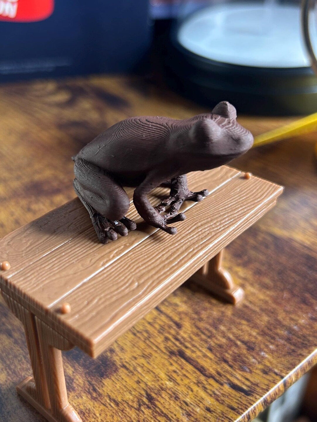Children's Harry Potter Chocolate Frog 3D printed model by NiccieNacks, featuring detailed chocolate frog design for display or play.