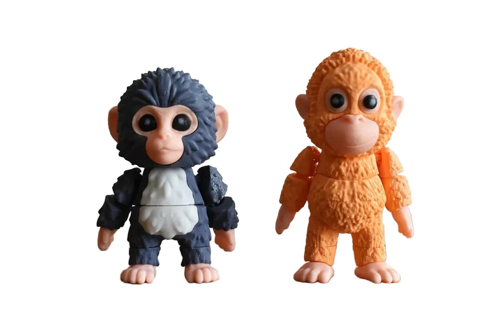 Colorful Punch Monkey and plush friend mini flexi 3D printed toy for children, featuring bright, soft, and flexible design by NiccieNacks.