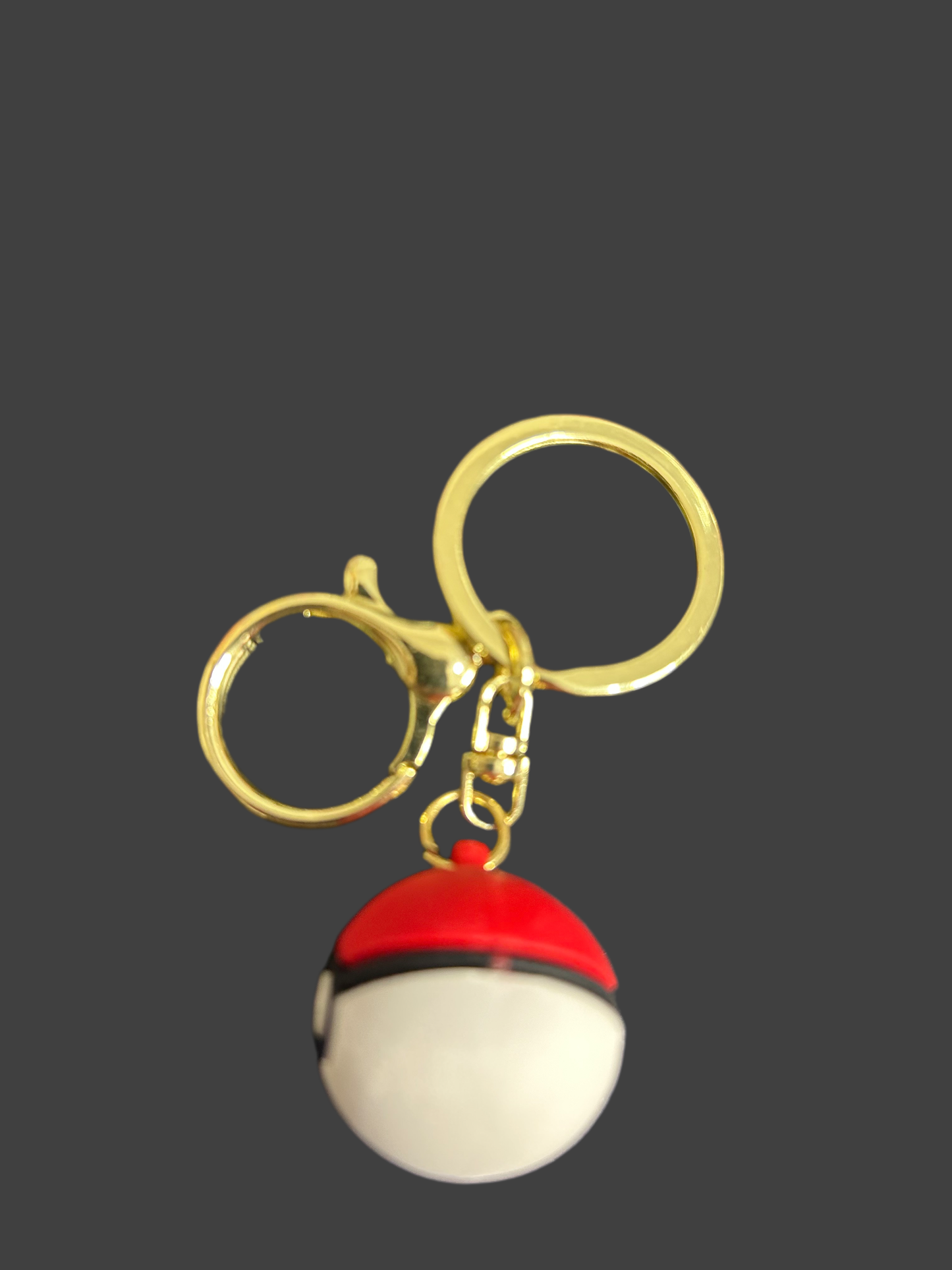 Pokemon Ball keyring by NiccieNacks featuring a red, white, and black spherical design perfect for keychains and accessories.