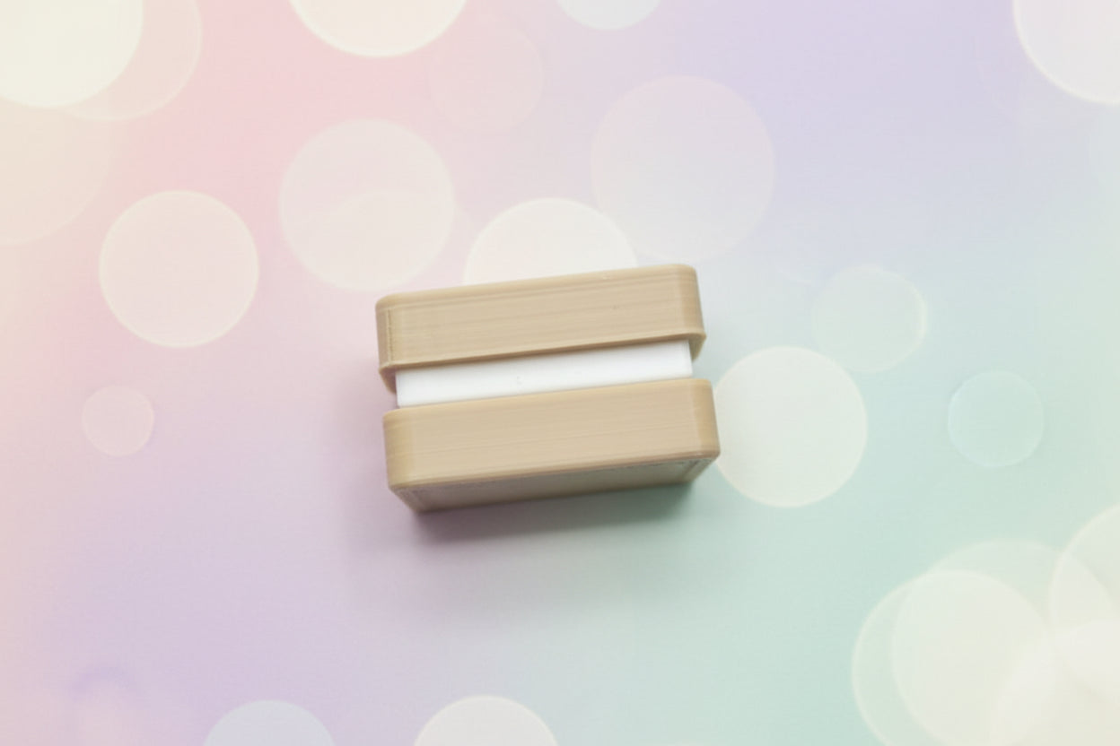 NiccieNacks custard cream biscuit fidget toy with clicker buttons and realistic biscuit design, perfect for sensory engagement.