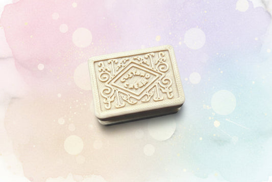 NiccieNacks custard cream biscuit fidget toy clicker with realistic biscuit design and colorful clickable buttons.