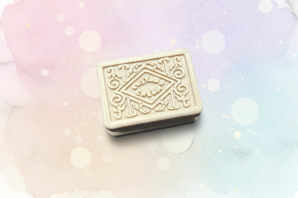 NiccieNacks custard cream biscuit fidget toy clicker with realistic biscuit design and colorful clickable buttons.