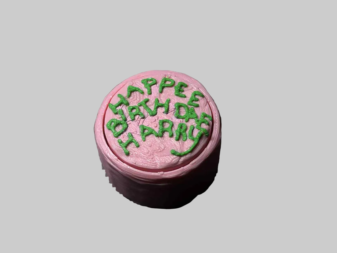 Harry Potter Hagrid’s Birthday Cake fidget clicker by NiccieNacks, colorful silicone sensory toy with clicking buttons.