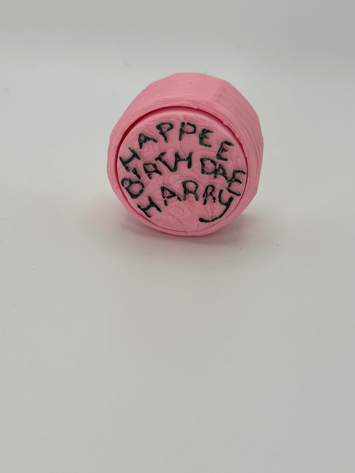 NiccieNacks Harry Potter Hagrid’s Birthday Cake fidget clicker with colorful cake design and tactile clicking buttons for stress relief.
