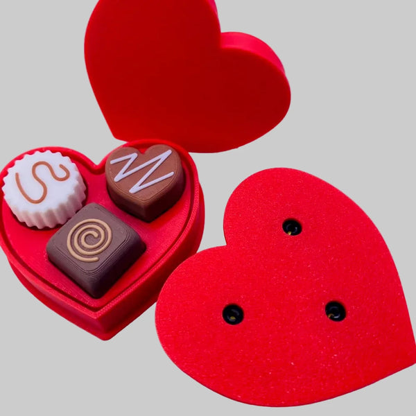Heart-shaped NiccieNacks fidget clicker toy with tactile buttons, designed for stress relief and sensory engagement.