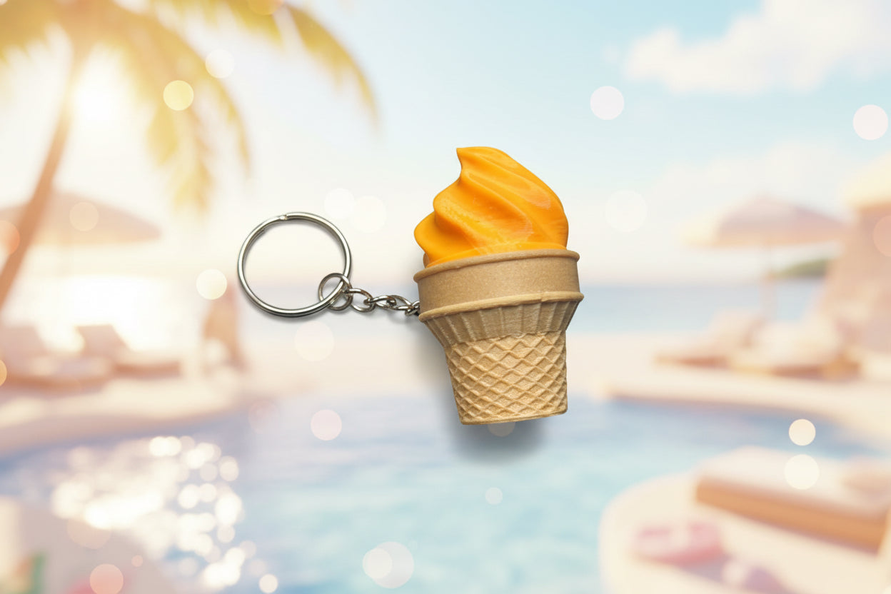 NiccieNacks ice cream cone fidget clicker toy keychain with colorful design, compact and portable for stress relief and sensory fun.