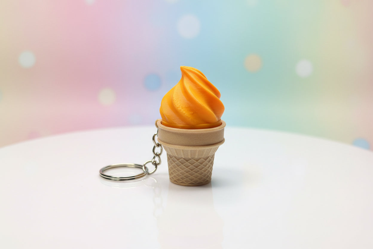 NiccieNacks ice cream cone fidget clicker toy keychain with colorful design and clickable ice cream cone shape.