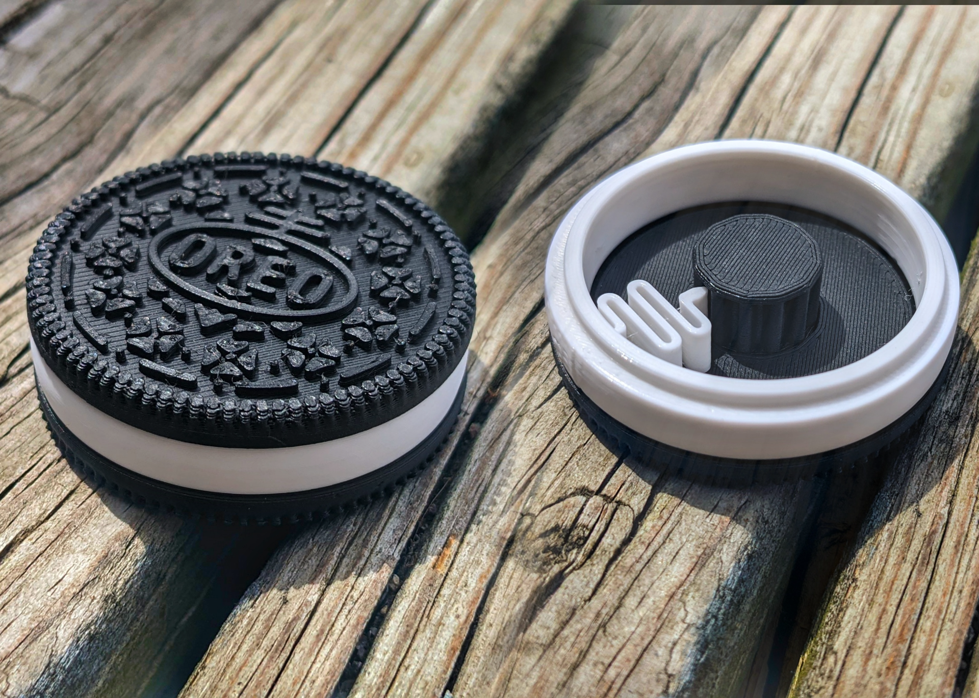 NiccieNacks Oreo Cookie Fidget Twister Clicker, small sensory fidget toy with clicker features resembling a cookie.