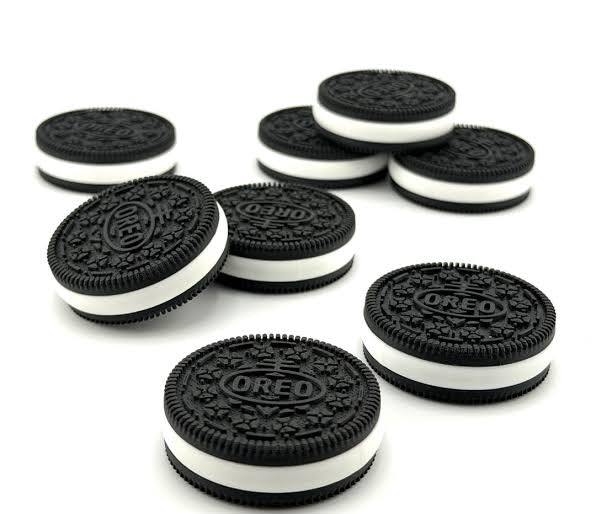 NiccieNacks Oreo Cookie Fidget Twister Clicker showing a round cookie-shaped fidget toy with clickable segments