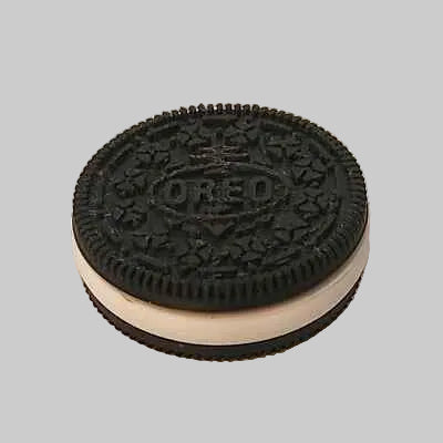 NiccieNacks Oreo Cookie Fidget Twister Clicker, small silicone fidget toy with cookie design and clicker buttons for stress relief.