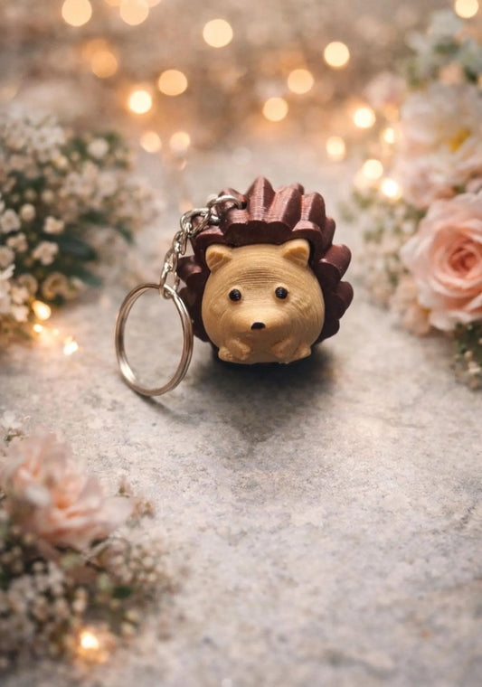 3D printed hedgehog keychain fidget clicker from NiccieNacks featuring textured woodland animal charm and detailed design.