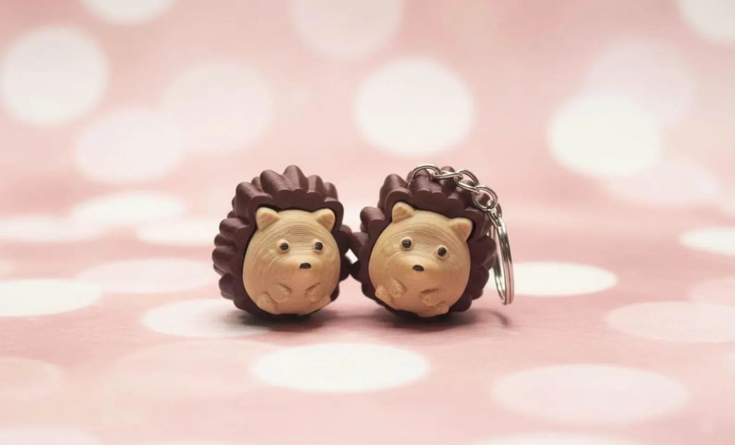 3D printed hedgehog keychain fidget clicker with textured woodland animal charm by NiccieNacks, featuring detailed spines and adorable face.