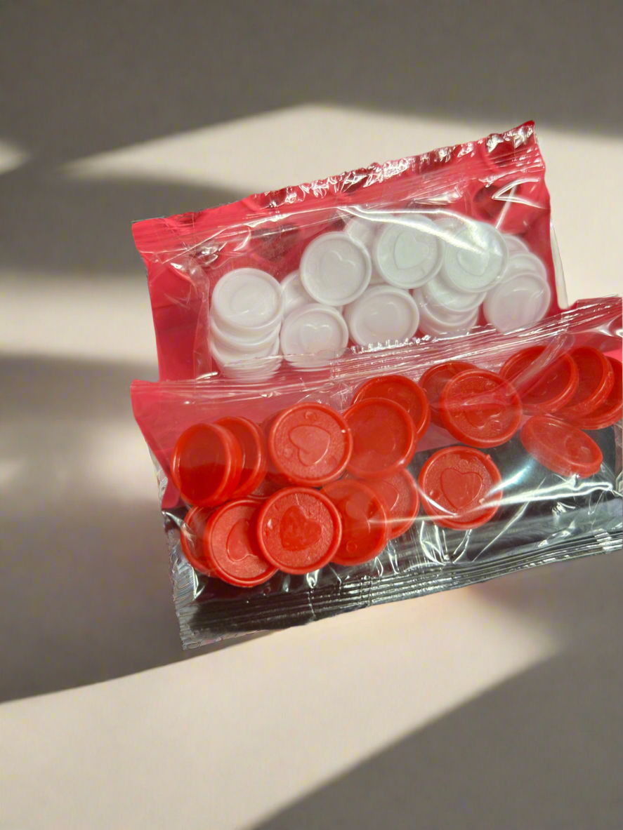 Heart Four in a Row travel game by NiccieNacks, compact gift set with colorful heart-shaped game pieces on a portable grid.