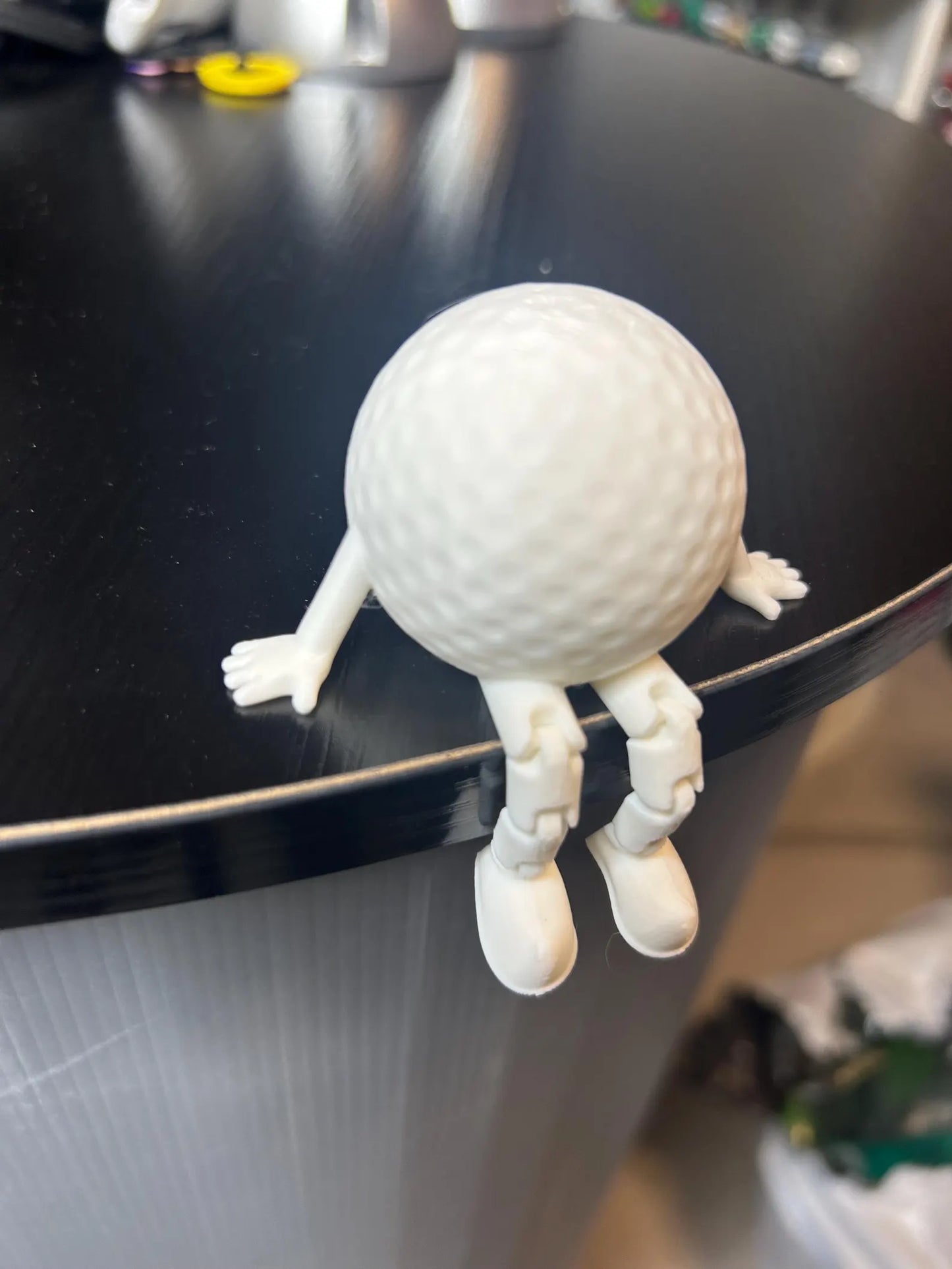 White articulated golf ball buddy toy ornament by NiccieNacks, featuring a playful design perfect for golf lovers and gift occasions.