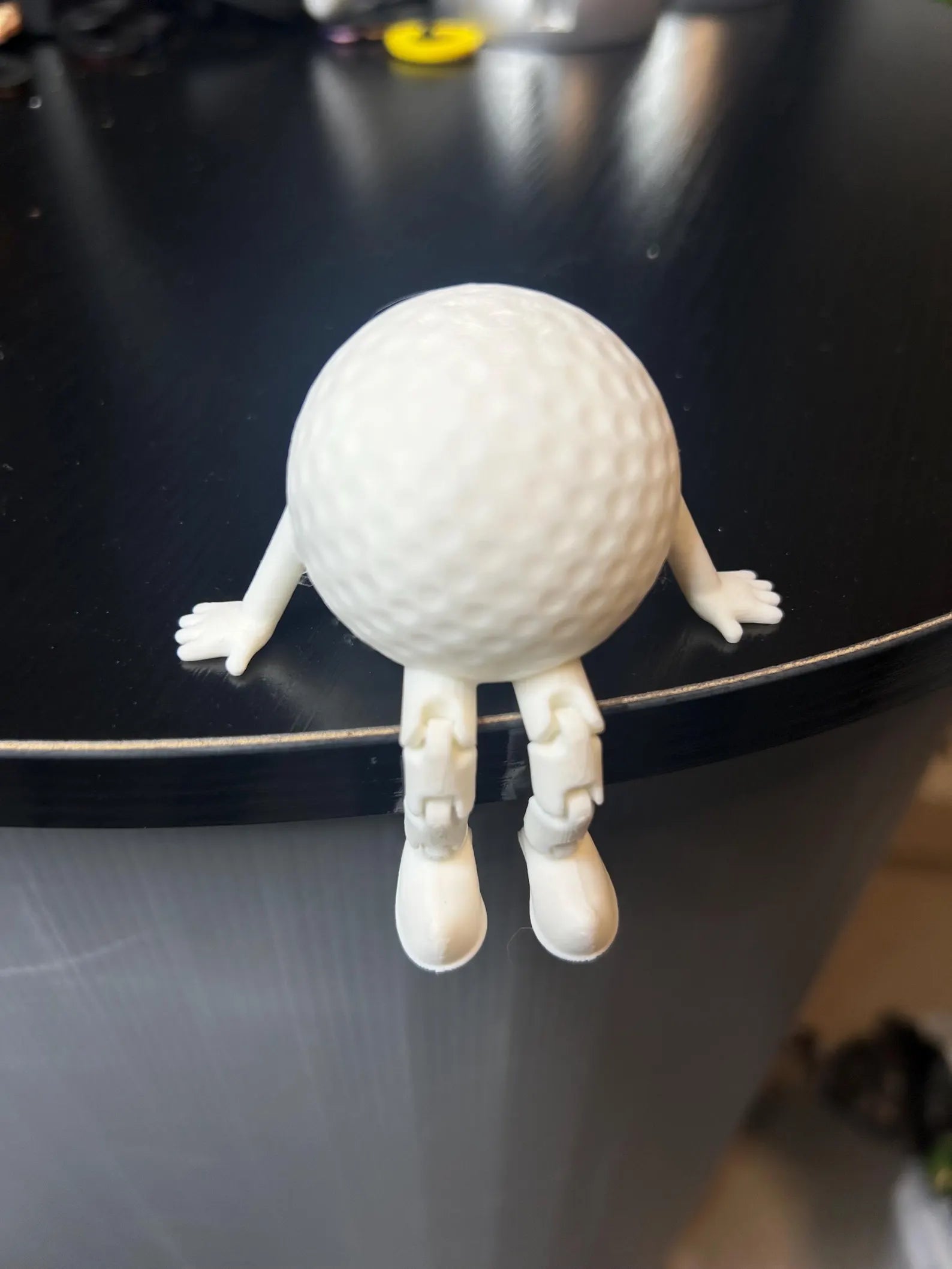 White articulated golf ball buddy toy ornament by NiccieNacks, featuring a playful design perfect for gift or decor.