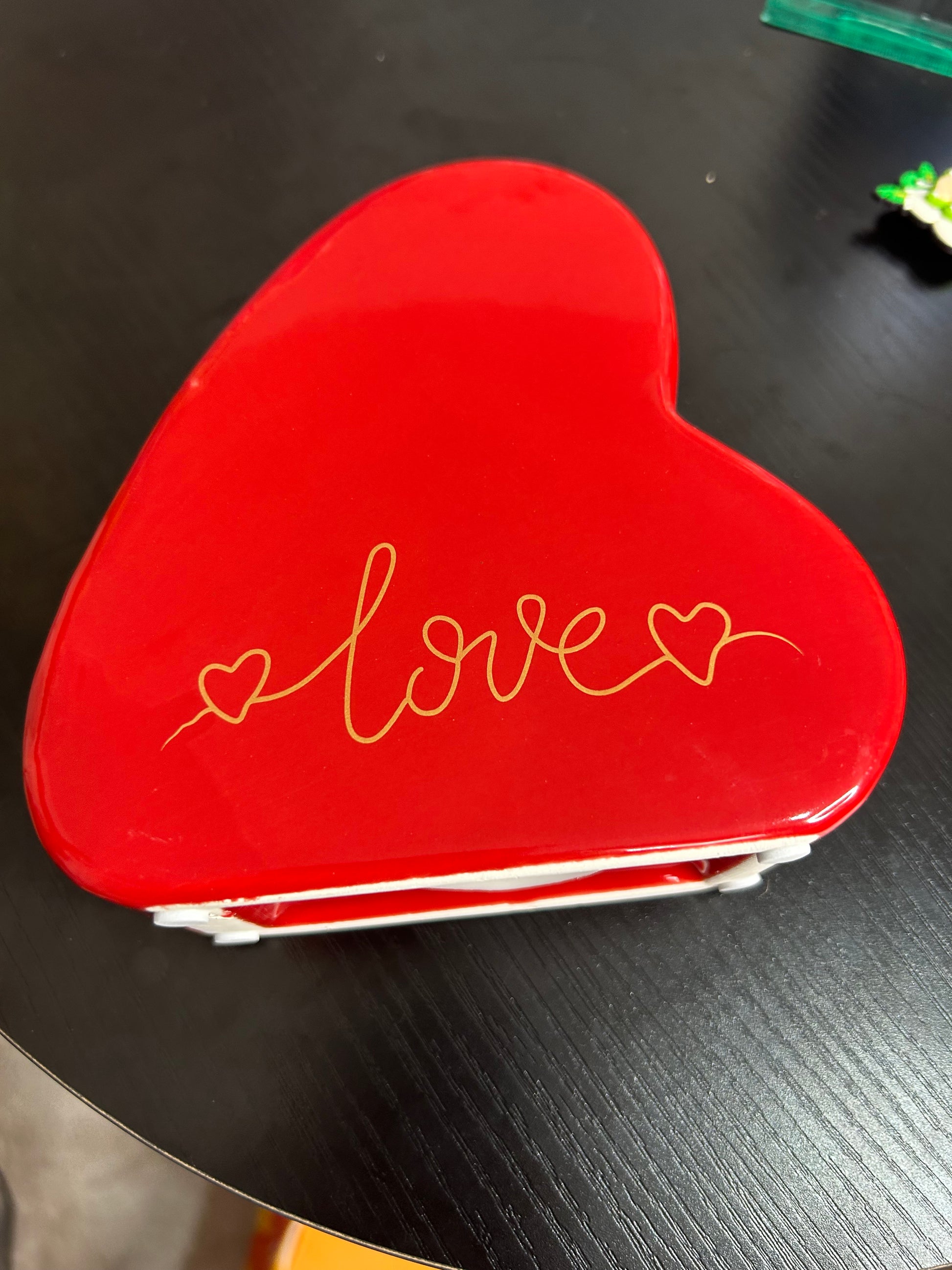 Red love heart ceramic money box for home decor by NiccieNacks, featuring a cute heart-shaped design with a slot for coins.