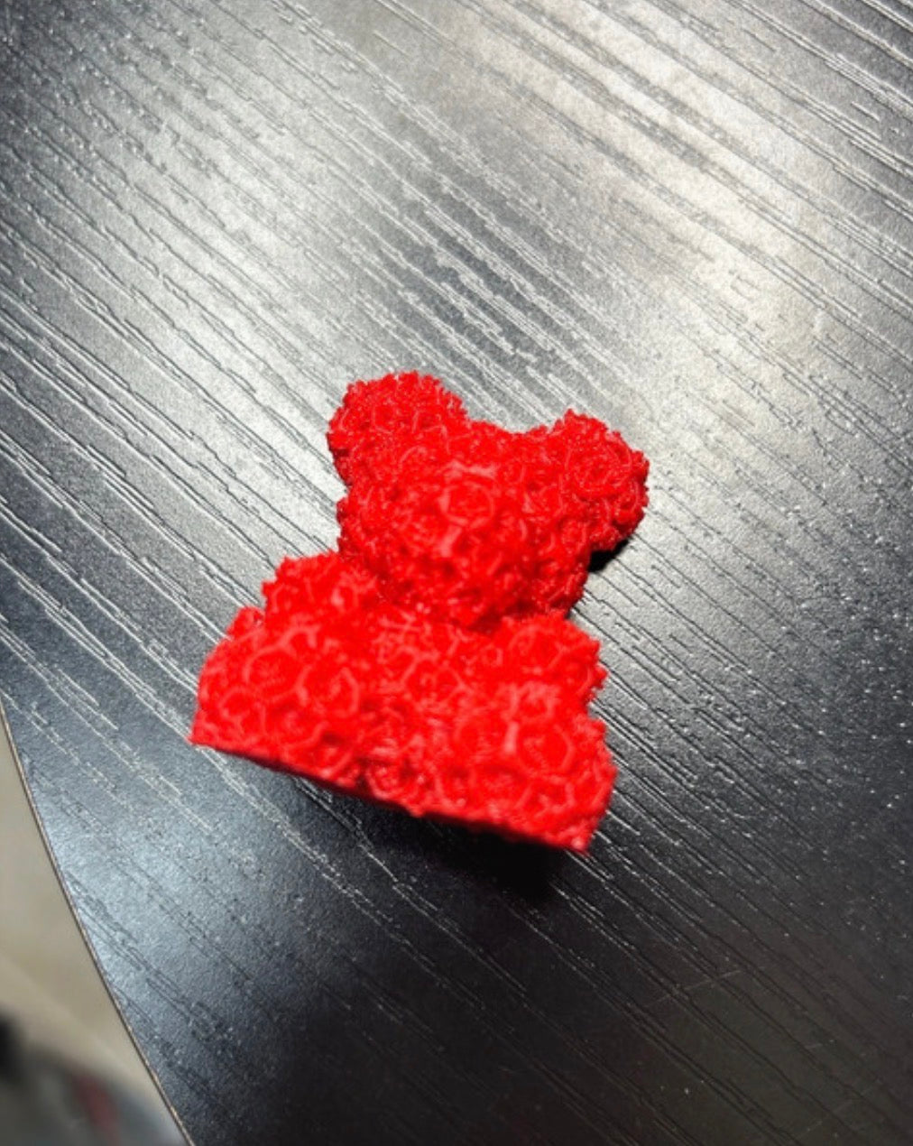 Red 3D printed rose bear model by NiccieNacks, decorative home accent with detailed rose design and realistic appearance.
