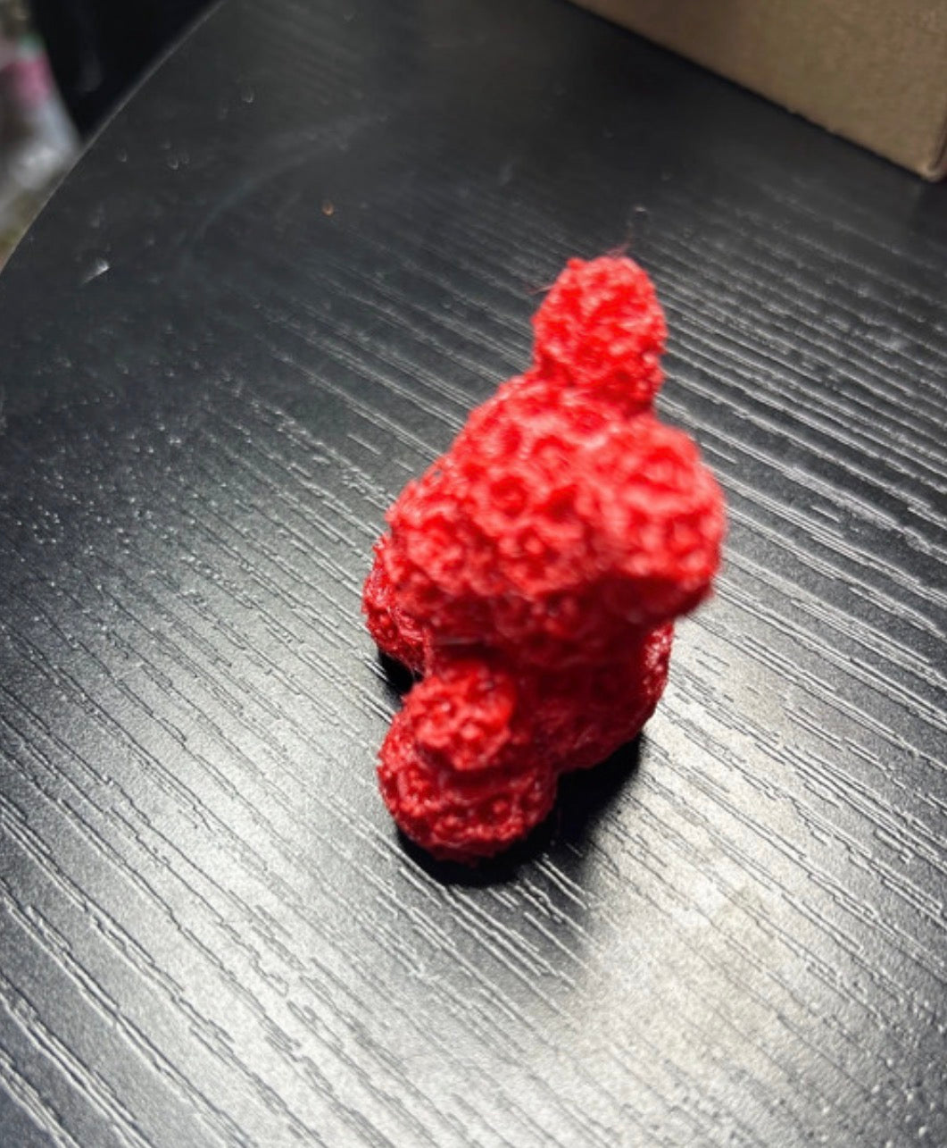 Red 3D printed rose bear model by NiccieNacks, decorative home ornament with intricate rose design and lifelike bear shape.