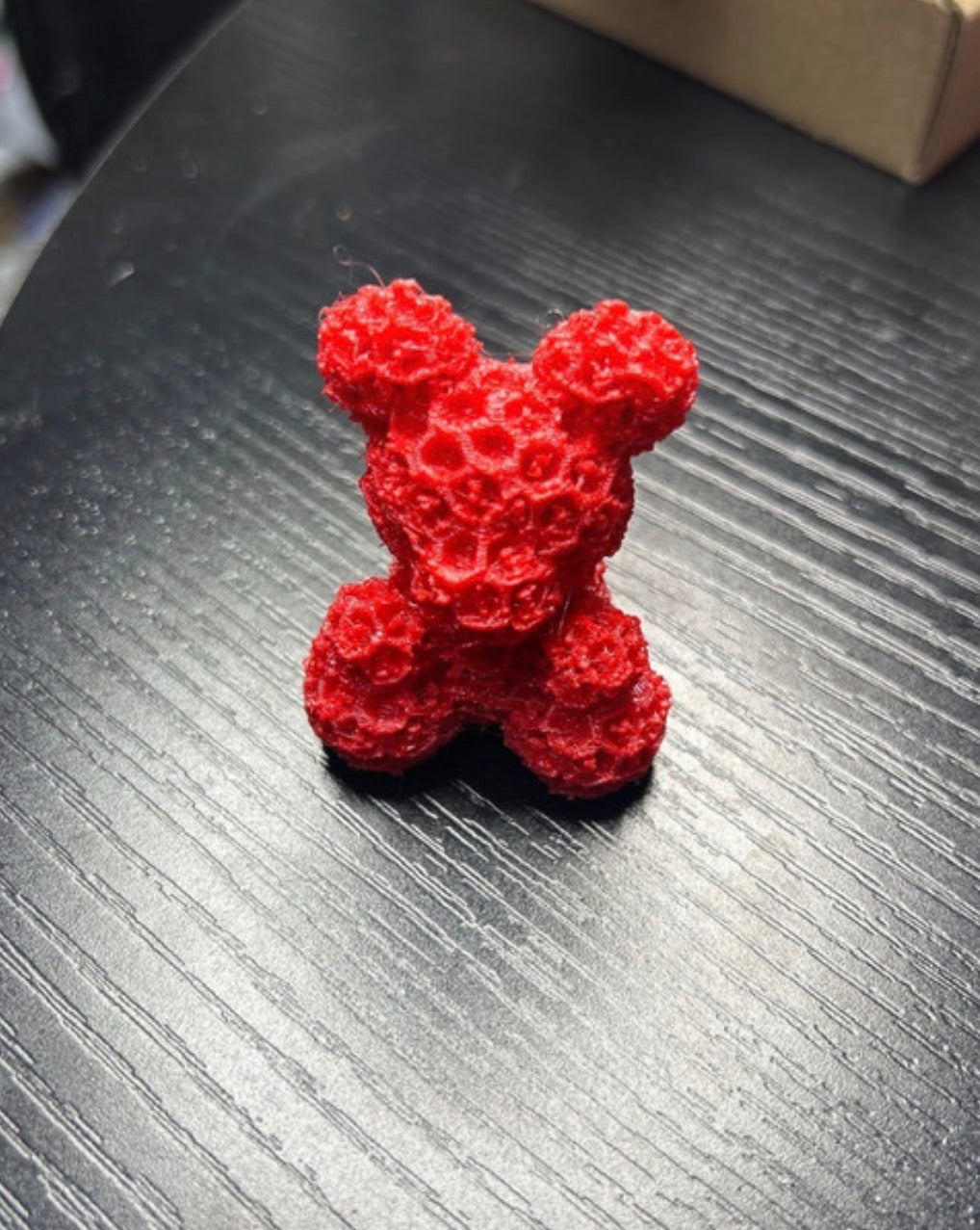 3D printed red rose bear model from NiccieNacks, decorative home ornament with detailed rose and bear design.