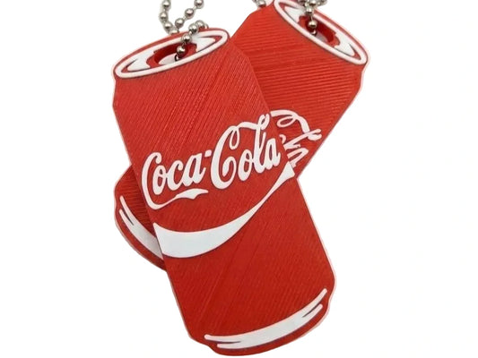NiccieNacks Coca-Cola can tab opener keychain showing a small metal opener attached to a branded keychain.