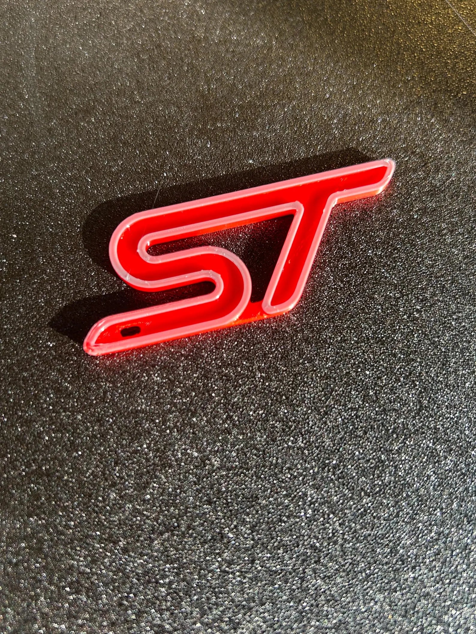 Ford ST Line logo keychain by NiccieNacks showing a sleek metal keyring with the Ford ST Line emblem.