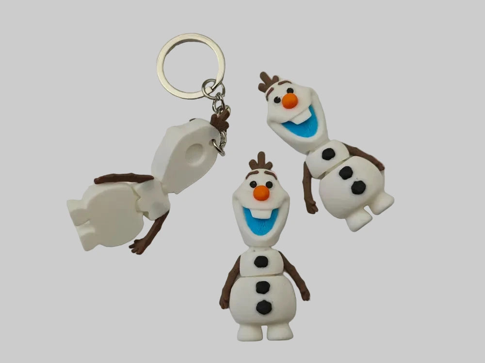 Frozen Olaf mini flexi keychain by NiccieNacks featuring a colorful Olaf character from Disney's Frozen.