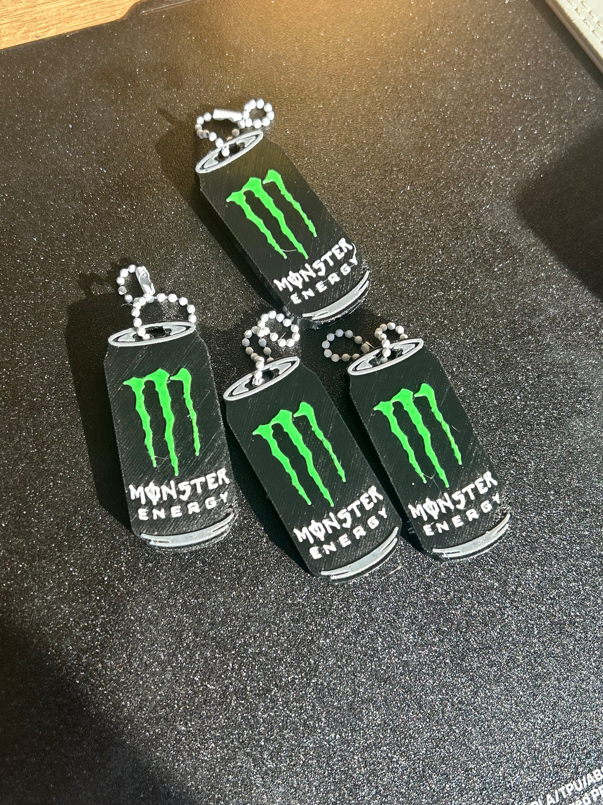 NiccieNacks Monster Energy can opener keyring keychain showing compact design and branded logo on metal keyring.
