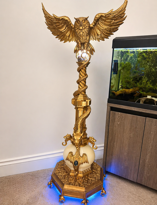 3D printed Harry Potter Dumbledore’s Owl model by NiccieNacks, detailed wizarding world figurine on a podium.