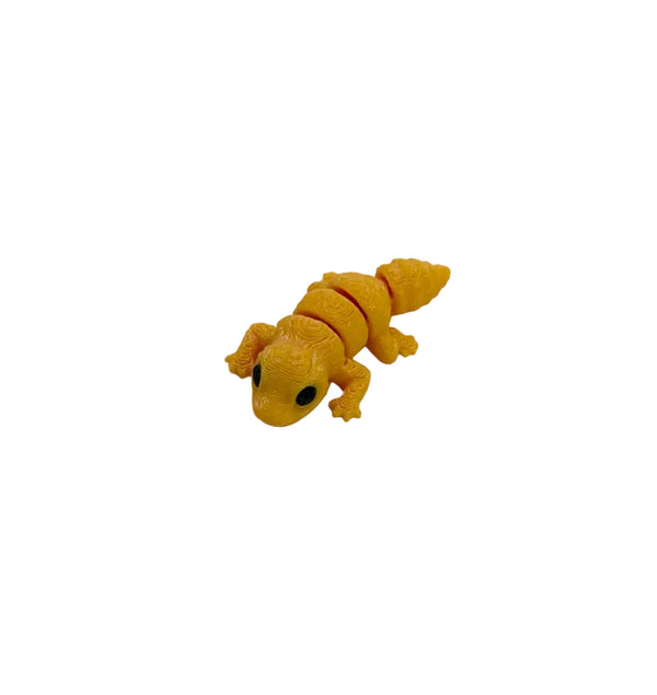 Small NiccieNacks Baby Leopard Gecko Wiggies articulated 3D printed animal toy, showing detailed textured features.