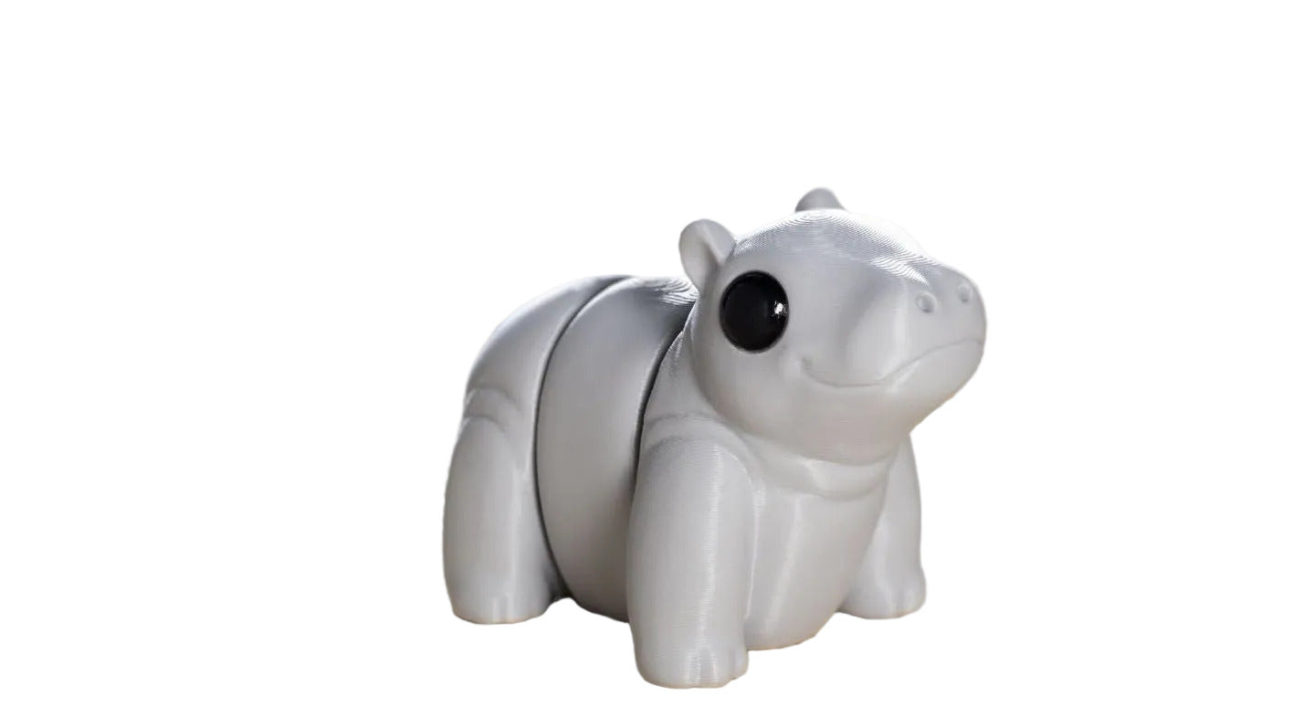 Small articulated Hippo Wiggies toy from NiccieNacks, featuring a cute baby hippo with detailed facial features and soft texture.
