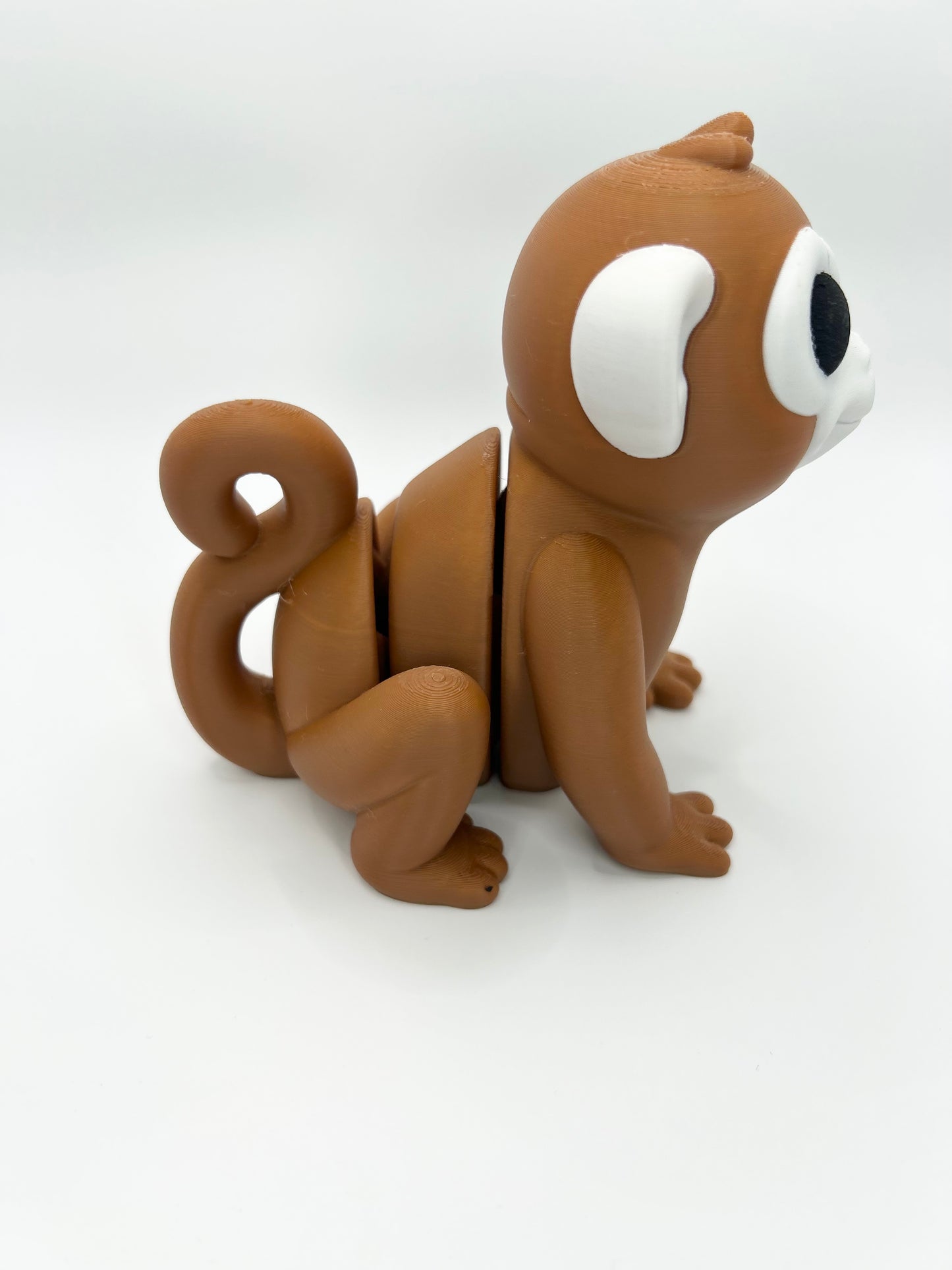 Articulated large Monkey Wiggies toy by NiccieNacks, featuring colorful, flexible limbs and detailed monkey face, suitable for collection or play.