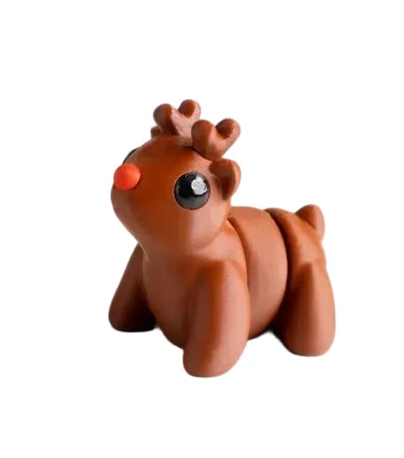 Small articulated reindeer Wiggies toy by NiccieNacks featuring a cute reindeer figure with movable limbs.