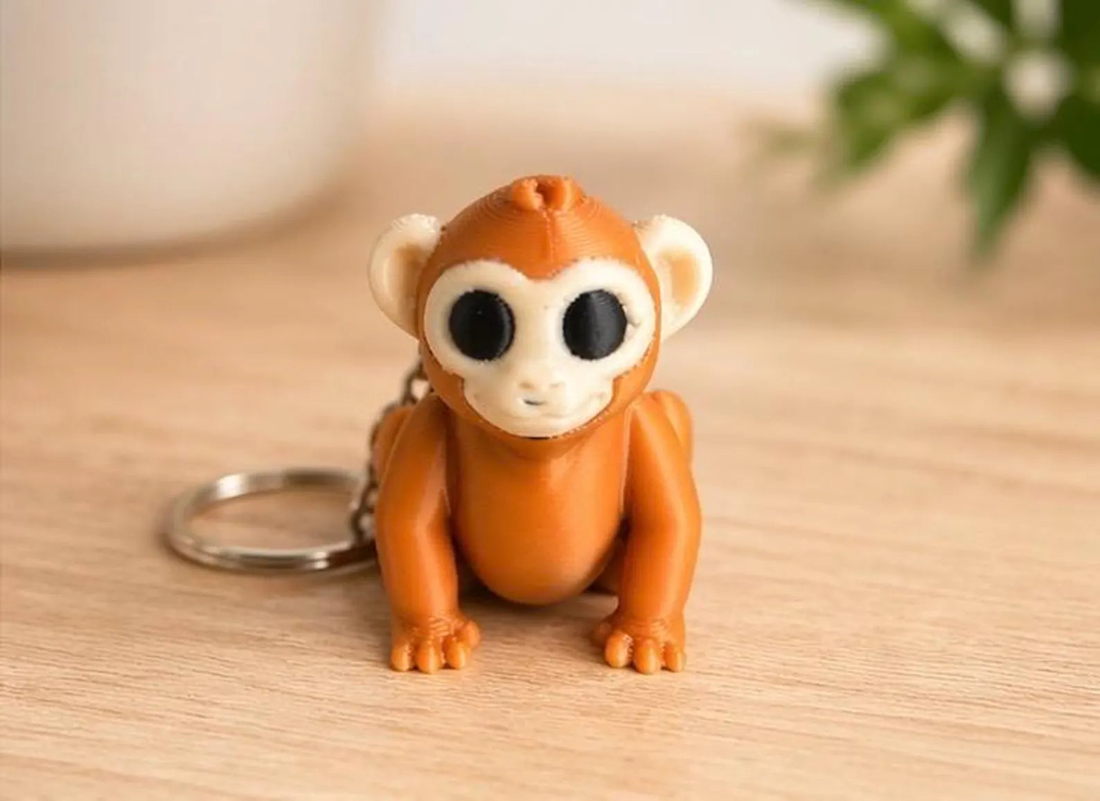 NiccieNacks Monkey Wigglets articulated moving keychain featuring a playful monkey design with flexible, wiggly limbs.