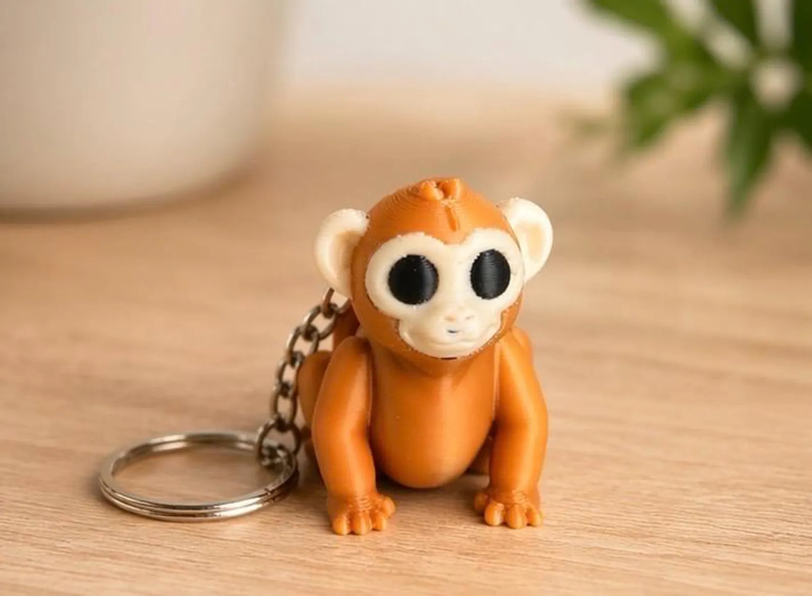 NiccieNacks Monkey Wigglets articulated moving keychain featuring a cute monkey with flexible joints and playful design.
