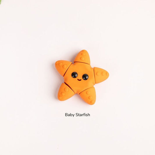 Baby Star Fish Wiggies articulated 3D printed toy by NiccieNacks, featuring a detailed, colorful starfish design.